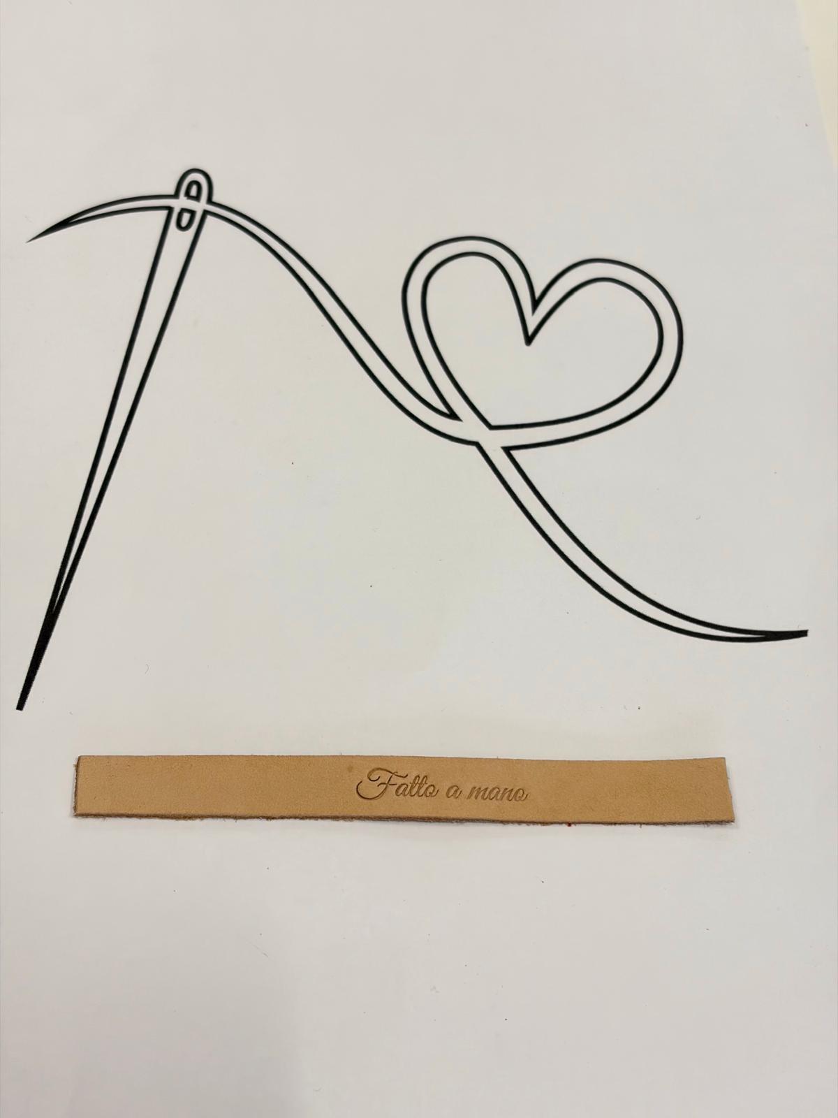 Etichetta “Fatto a mano” in cuoio inciso a caldo