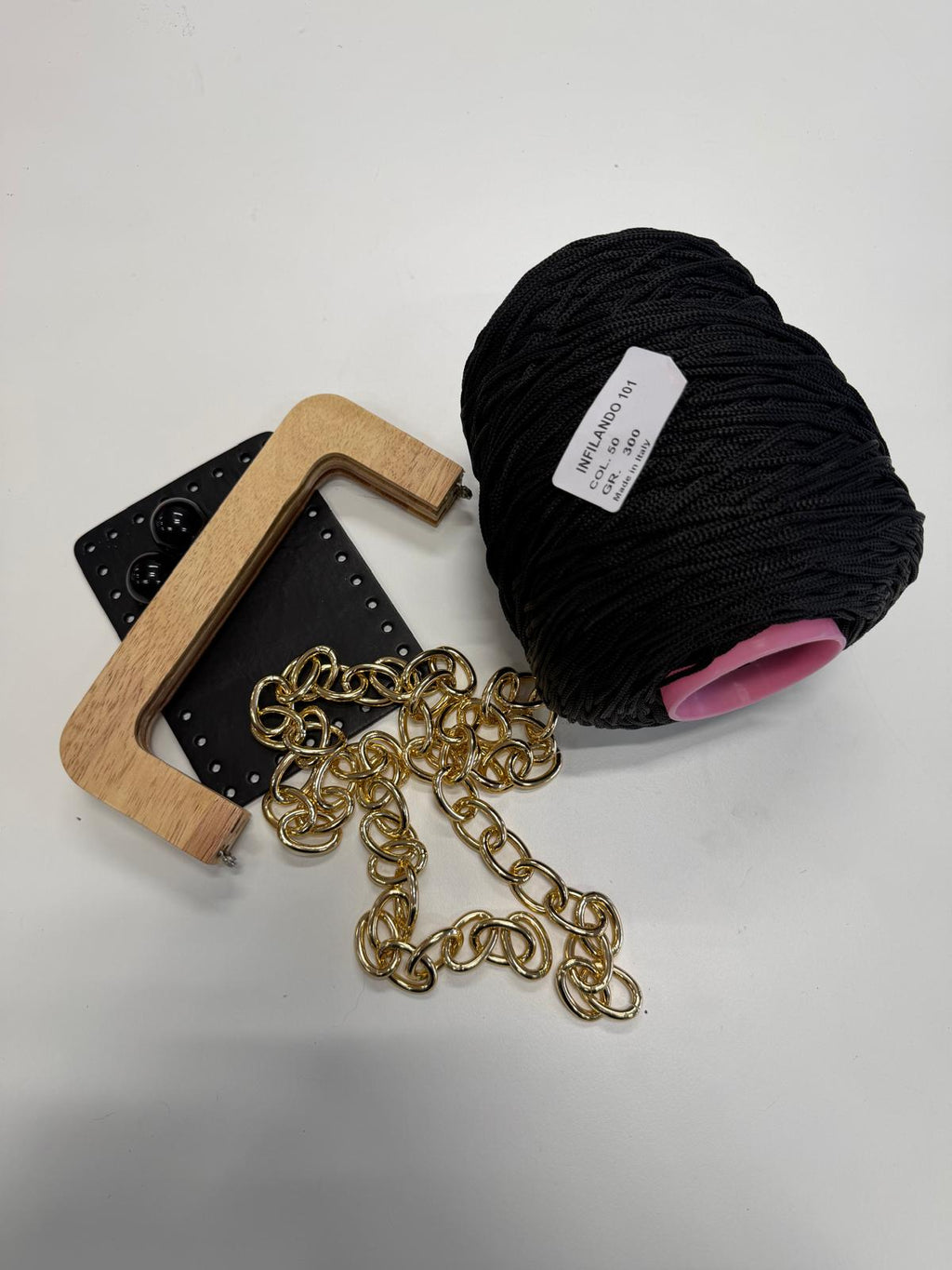 Chiusura a molla in legno "caramella nera"